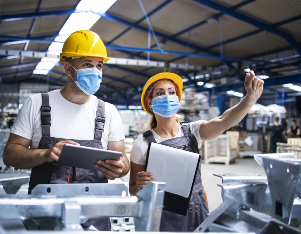 factory-workers-with-face-masks-protected-against-corona-virus-doing-quality-control-production-factory(1)